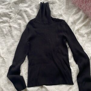 black tightly-fitted turtleneck!